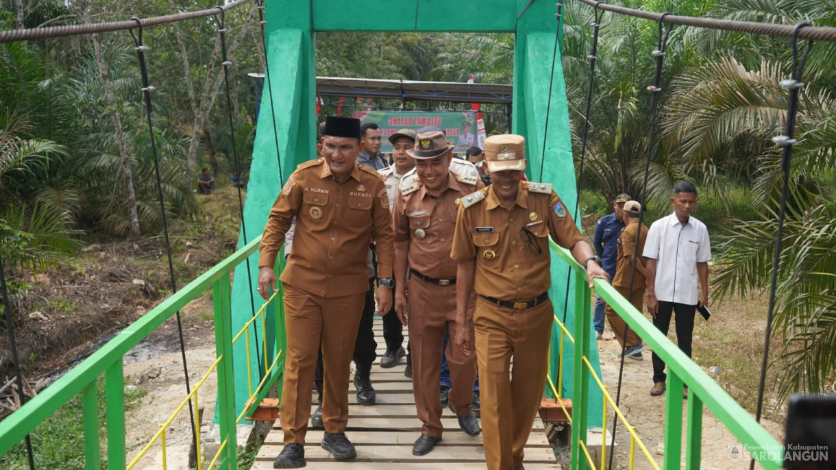 Acara Panen Raya Jagung dan Peresmian Jembatan Gantung Sepanjang 35 Meter di Desa Sungai Merah Kec. Pelawan