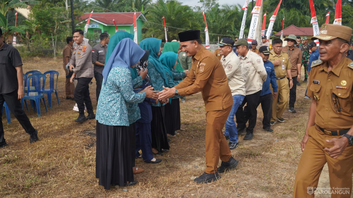 Acara Panen Raya Jagung dan Peresmian Jembatan Gantung Sepanjang 35 Meter di Desa Sungai Merah Kec. Pelawan