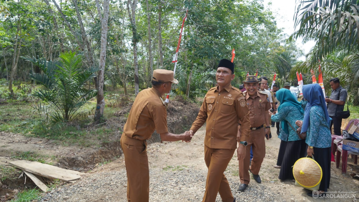 Acara Panen Raya Jagung dan Peresmian Jembatan Gantung Sepanjang 35 Meter di Desa Sungai Merah Kec. Pelawan