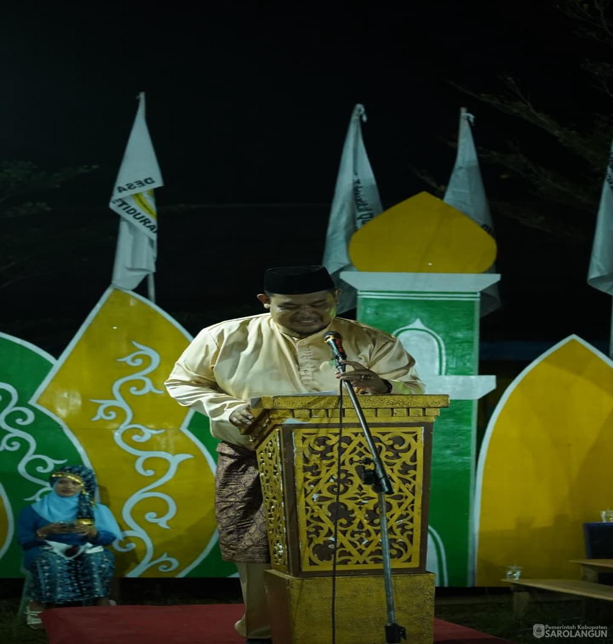 22 Juni 2026 Wakil Bupati Sarolangun Membuka Secara Resmi Musabaqah Tilawatil Quran ke III Tingkat Kecamatan Mandiangin Timur di Lapangan Desa Meranti Baru