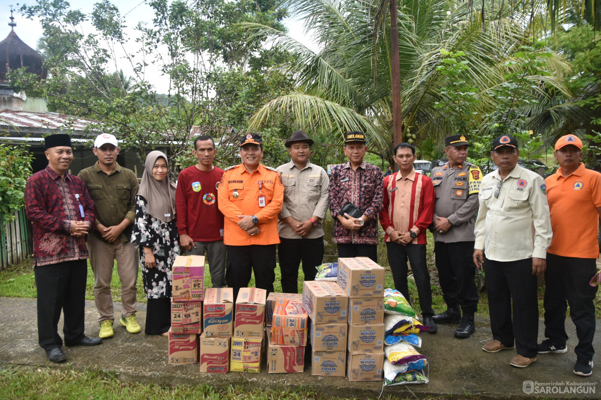 18 Januari 2023 - Menyerahkan Bantuan Kepada Korban Pasca Banjir Di Desa Rantau Panjang Kecamatan Batang Asai