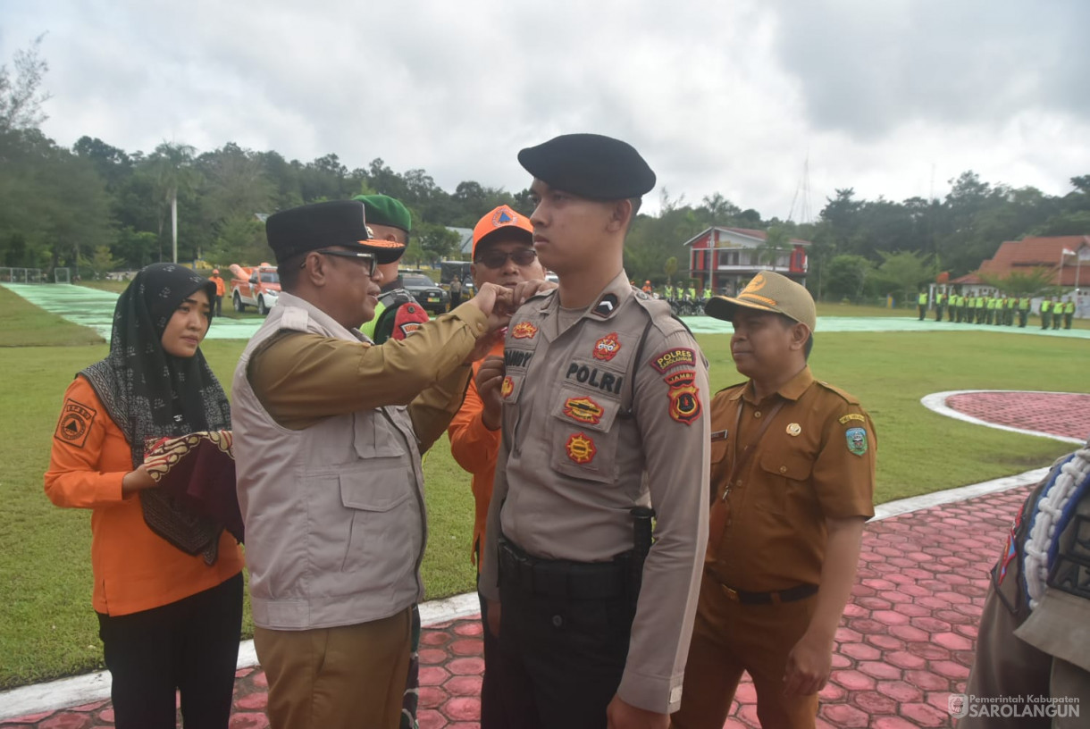 24 Desember 2024 - Apel Gabungan Dan Gelar Pasukan Siaga Bencana Hidrometeorologi di Kabupaten Sarolangun Tahun 2024, Bertempat di Lapangan Gunung Kembang Sarolan