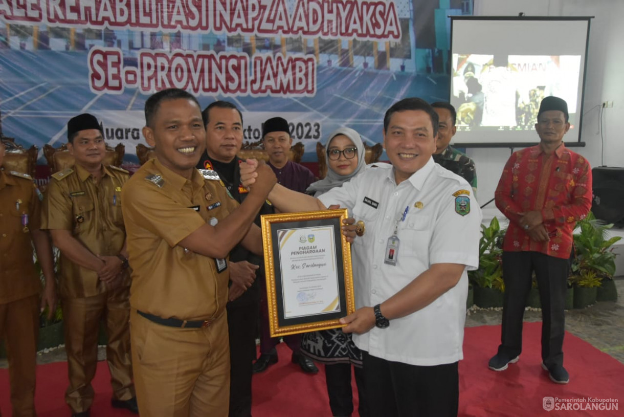 19 Oktober 2023 - Penjabat Bupati Sarolangun Menghadiri Acara Peresmian Rumah Restorative Justice dan BaleRehabilitasi Napza Adhyaksa SeProvinsi Jambi di Balai Desa Sungai Baung