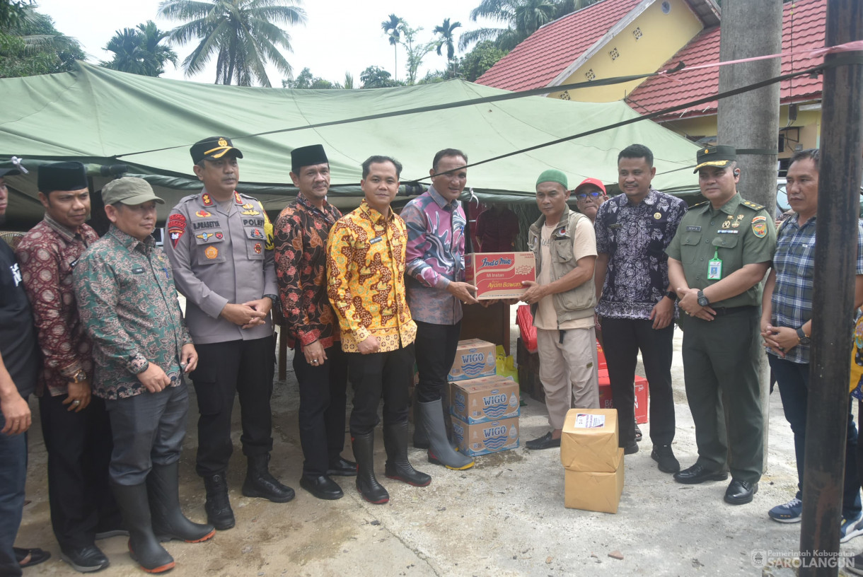 6 Maret 2025 -&nbsp;Peninjauan Lokasi Banjir dan Penyerahan Bantuan Bagi Korban Terdampak Banjir di Kecamatan Pauh