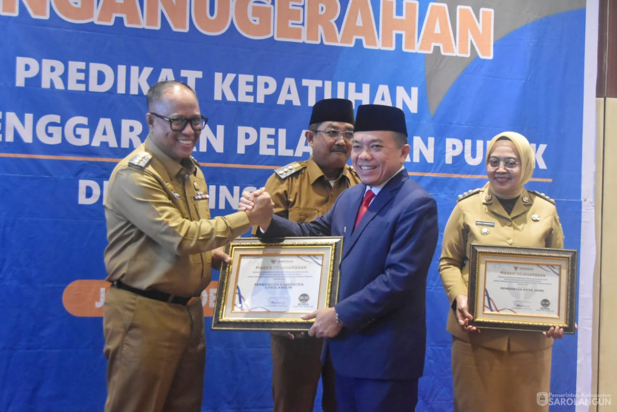 3 Desember 2024 - Penganugerahan Predikat Kepatuhan Penyelenggaraan Pelayanan Publik Di Provinsi Jambi, Bertempat di Aula Aston Hotel Kota Jambi